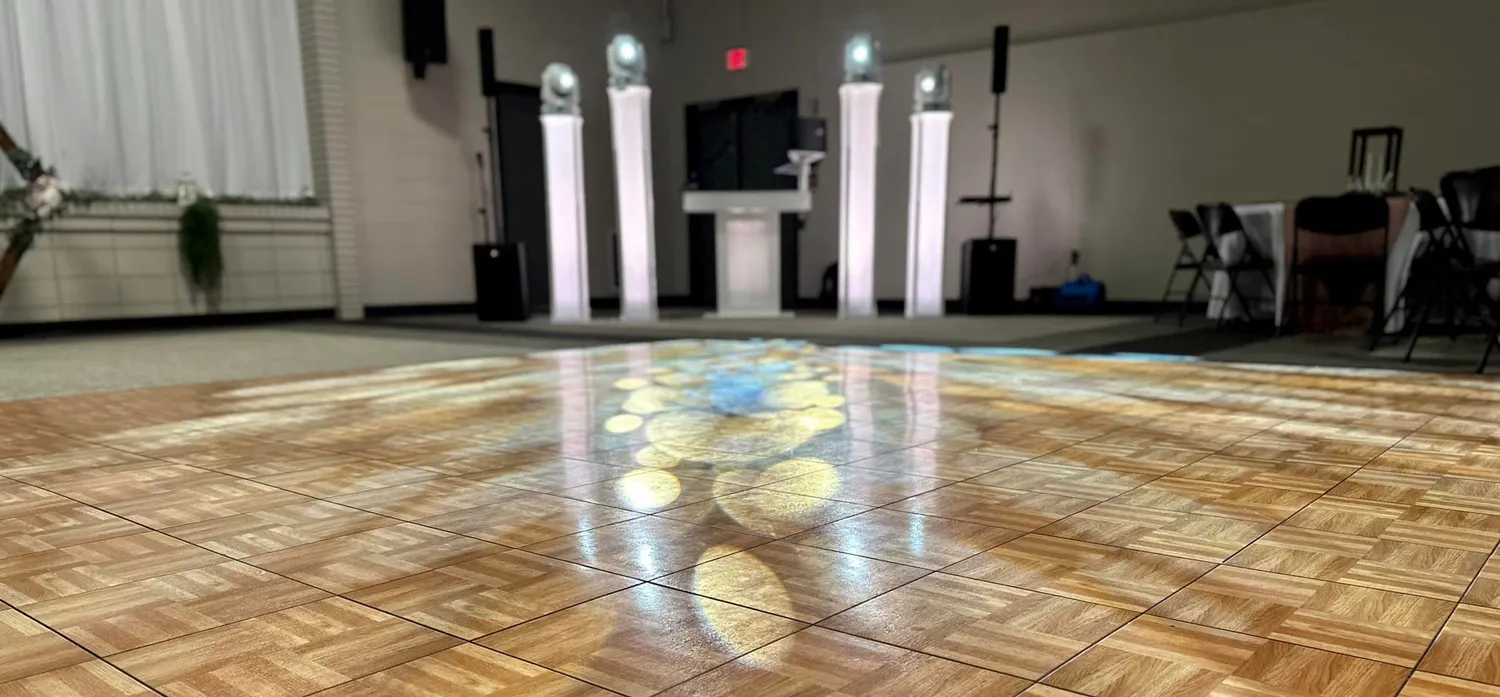 The parquet dance floor framed by columns